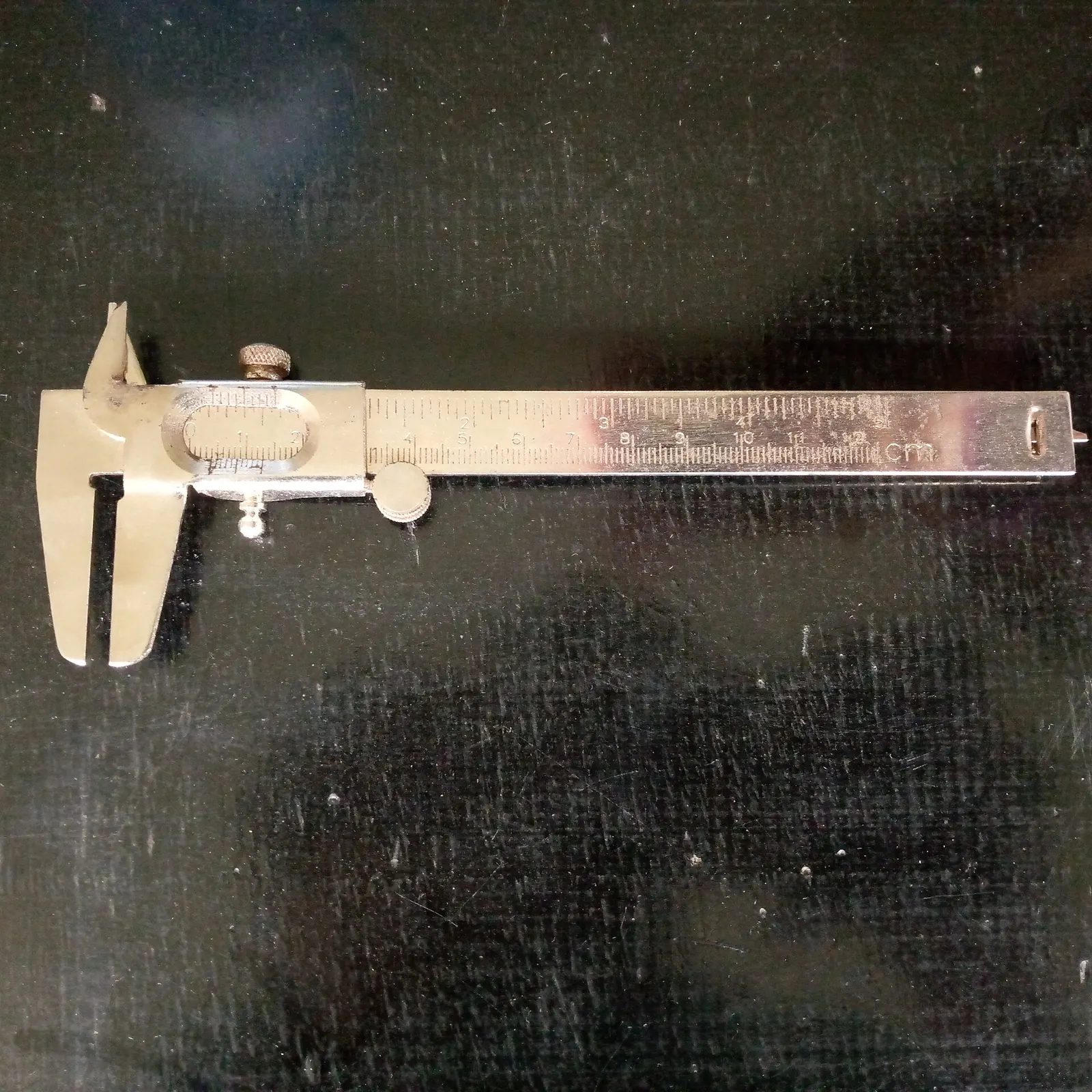A steel vernier caliper used for precise measurement